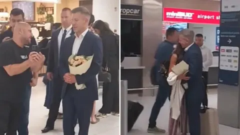 Péter Magyar u odelju s buketom cvijeća i trenutak grljenja s partnericom na aerodromu