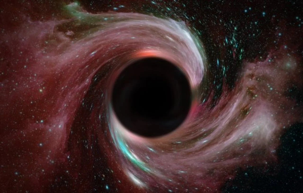 Svijetleći spiralni vrtlog kozmičke pline oko tamnog centra