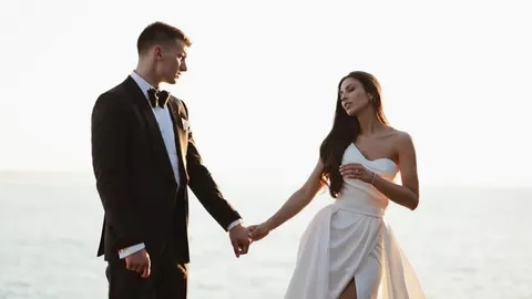 Dominik Livaković i supruga Helena u elegantnim vjenčanim odjevima