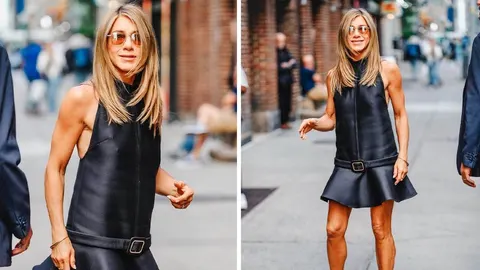 Dženifer Aniston u crnoj mini haljini bez rukava i sunčanim naočalama