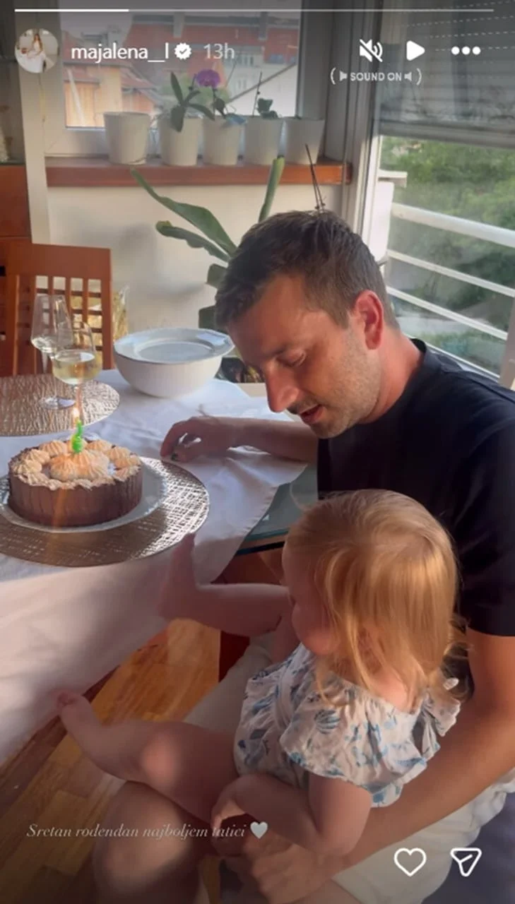 Karl Šeparović s djevčicom pored rođendanske torte