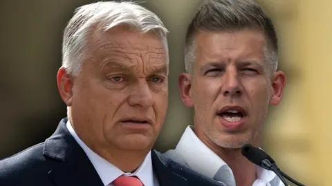 Portreti Viktora Orbána i Pétera Magyara jedan pored drugoga