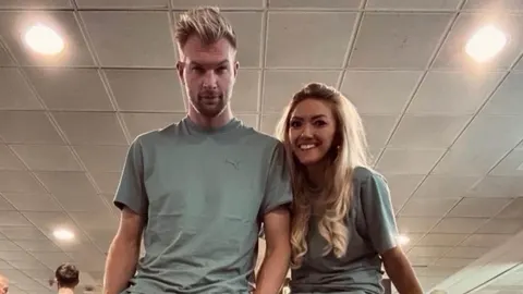 Ruben Van Gucht i Charlotte Van Looy u usklađenim sportskim kombinacijama