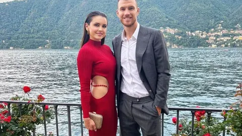 Edin i Amra Džeko poziraju nasmišljeni ispred jezera i planina